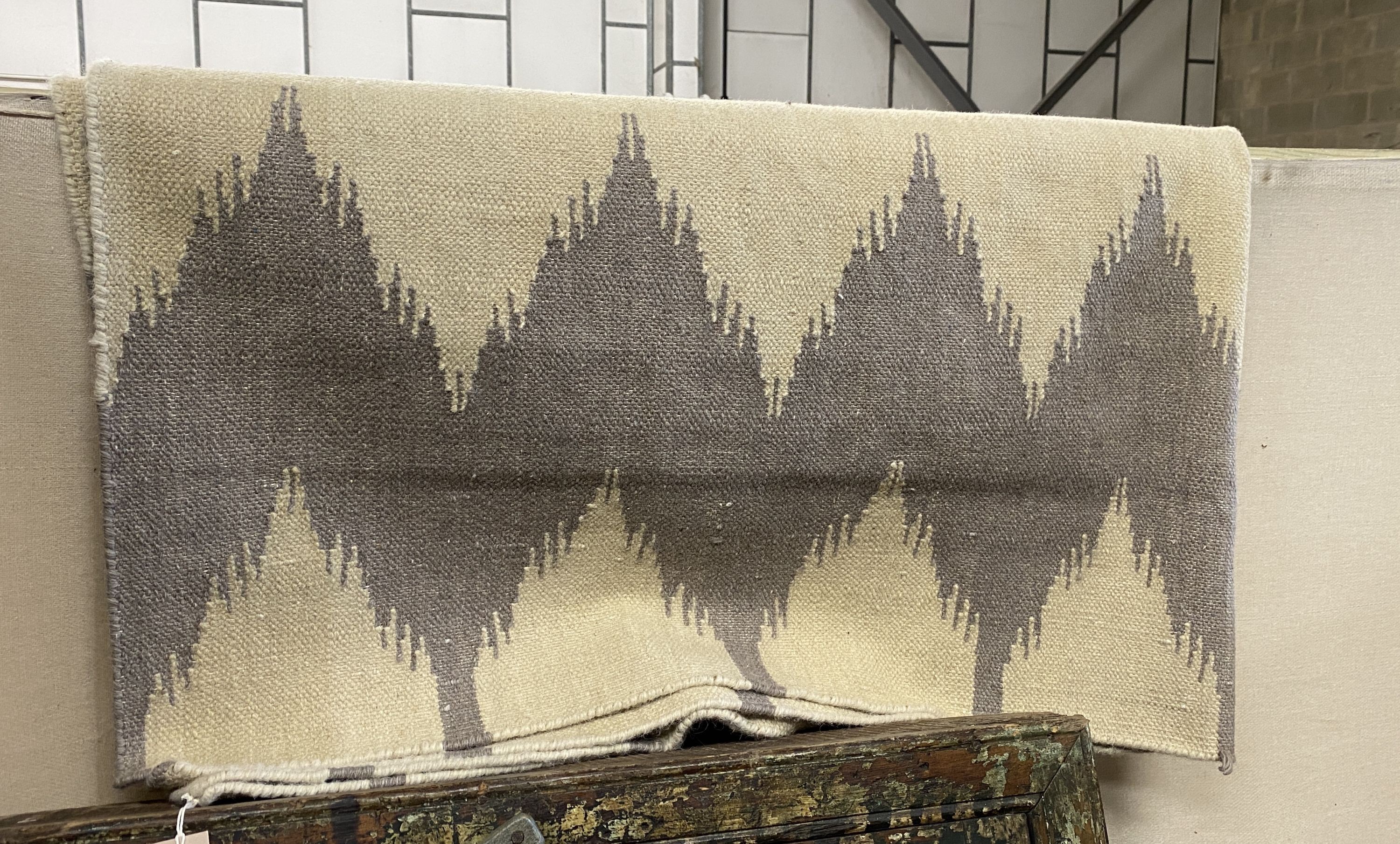 An Ikat contemporary dhurrie, approx. 200 x 160cm